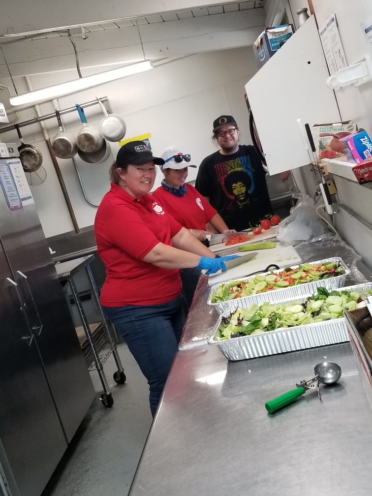 Heather Parson, owner of Big J’s BBQ Catering, prepares food for Mat-Su Valley wildfire victims
